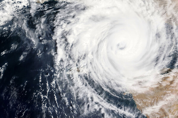 Hurricane cyclone moving over land | Alliant Private Client