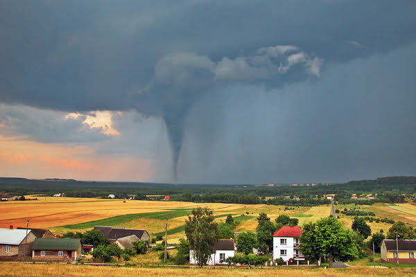 Tornado moving across field of houses | Alliant Private Client