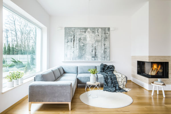 Living room with art hanging on wall | Alliant Private Client